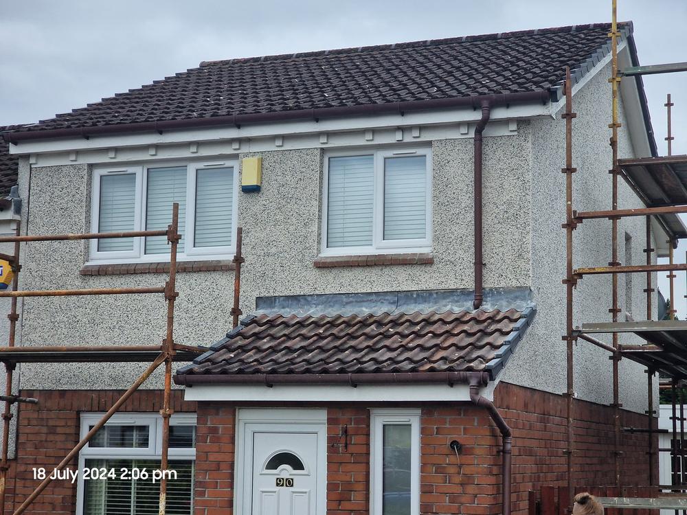 Completed front elevation in new dry dash render